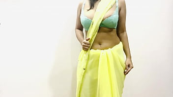 Sultry Indian Bhabhi In Yellow Saree Teasing With Her Big Boobs